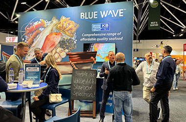 Blue Wave team speaking with foodservice professionals at Fine Food Sydney